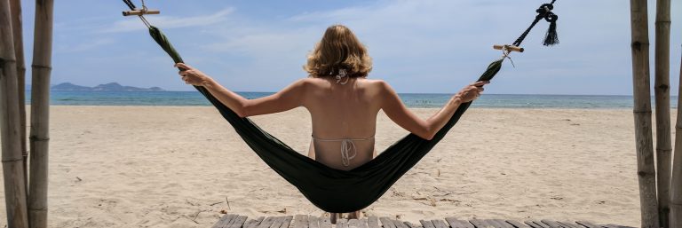 Girl sitting in hammock